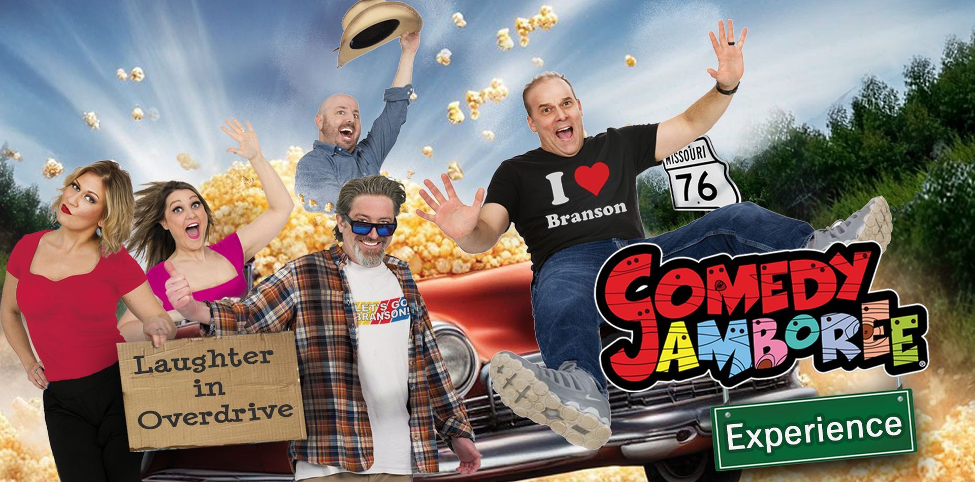 Four men in suits are singing into microphones on a stage.