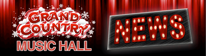 A sign that says grand country music hall and news