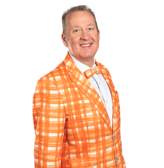 A man wearing an orange plaid jacket and bow tie