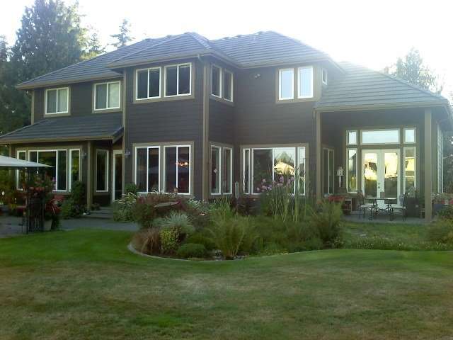 House Deck — House With Glass Windows in Maple Valley, WA