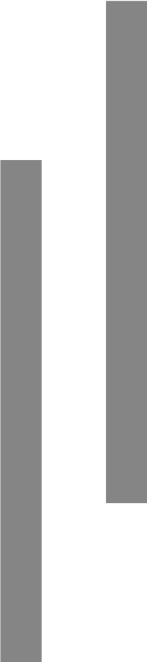 A shadow of a person is cast on a white surface.