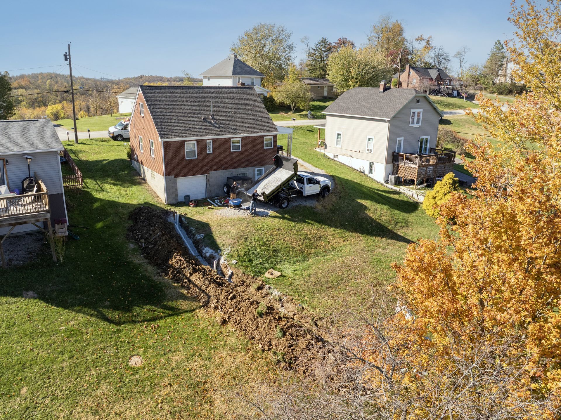 An aerial view of a large wave in the ocean.