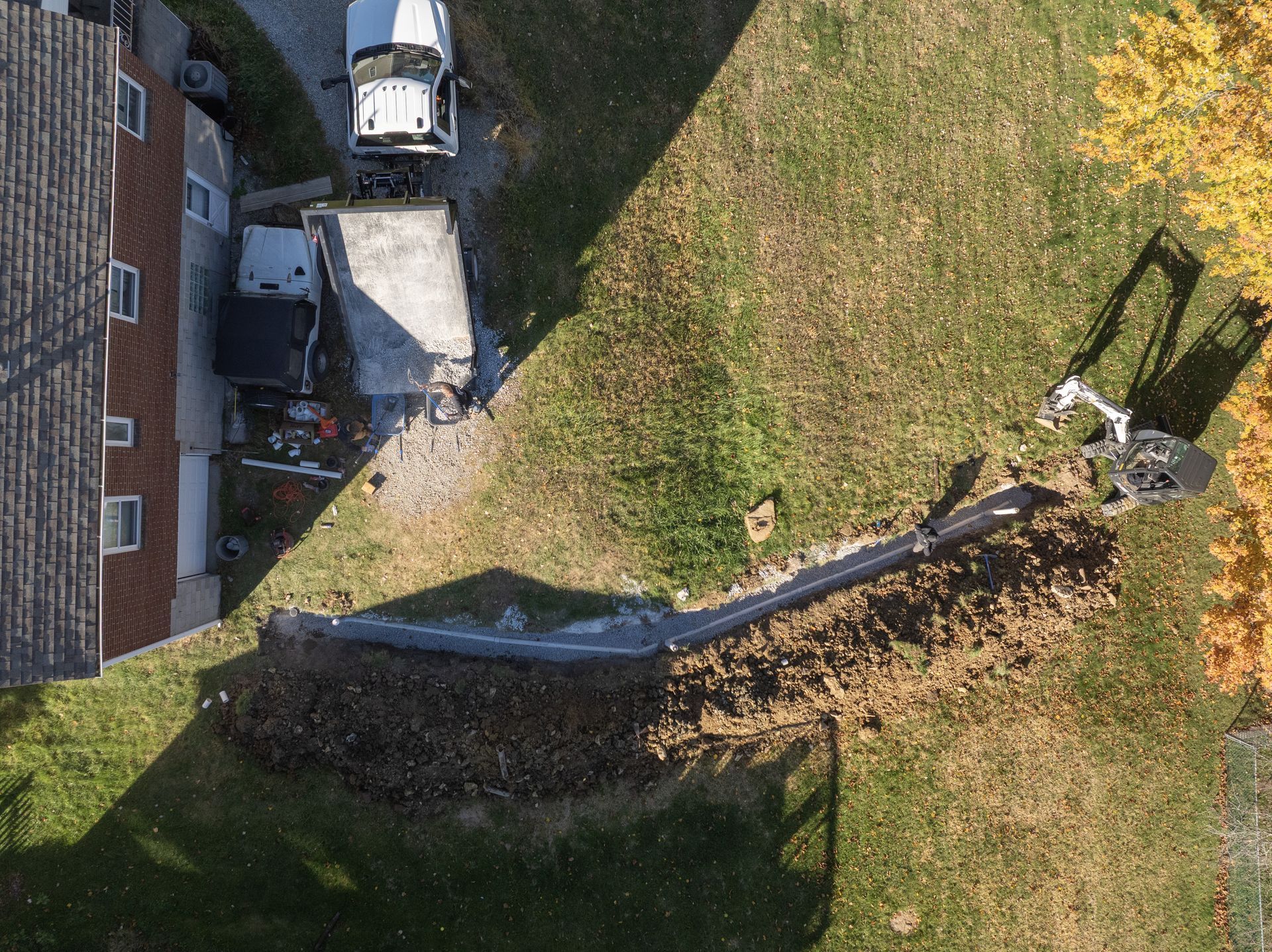 An aerial view of a large wave in the ocean.