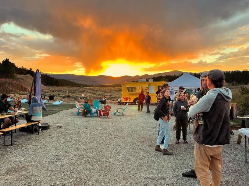 Ale Yak Beer Garden with sunset over mountains in background