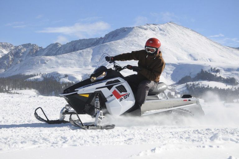 snowmobiler in Leadville's mountains