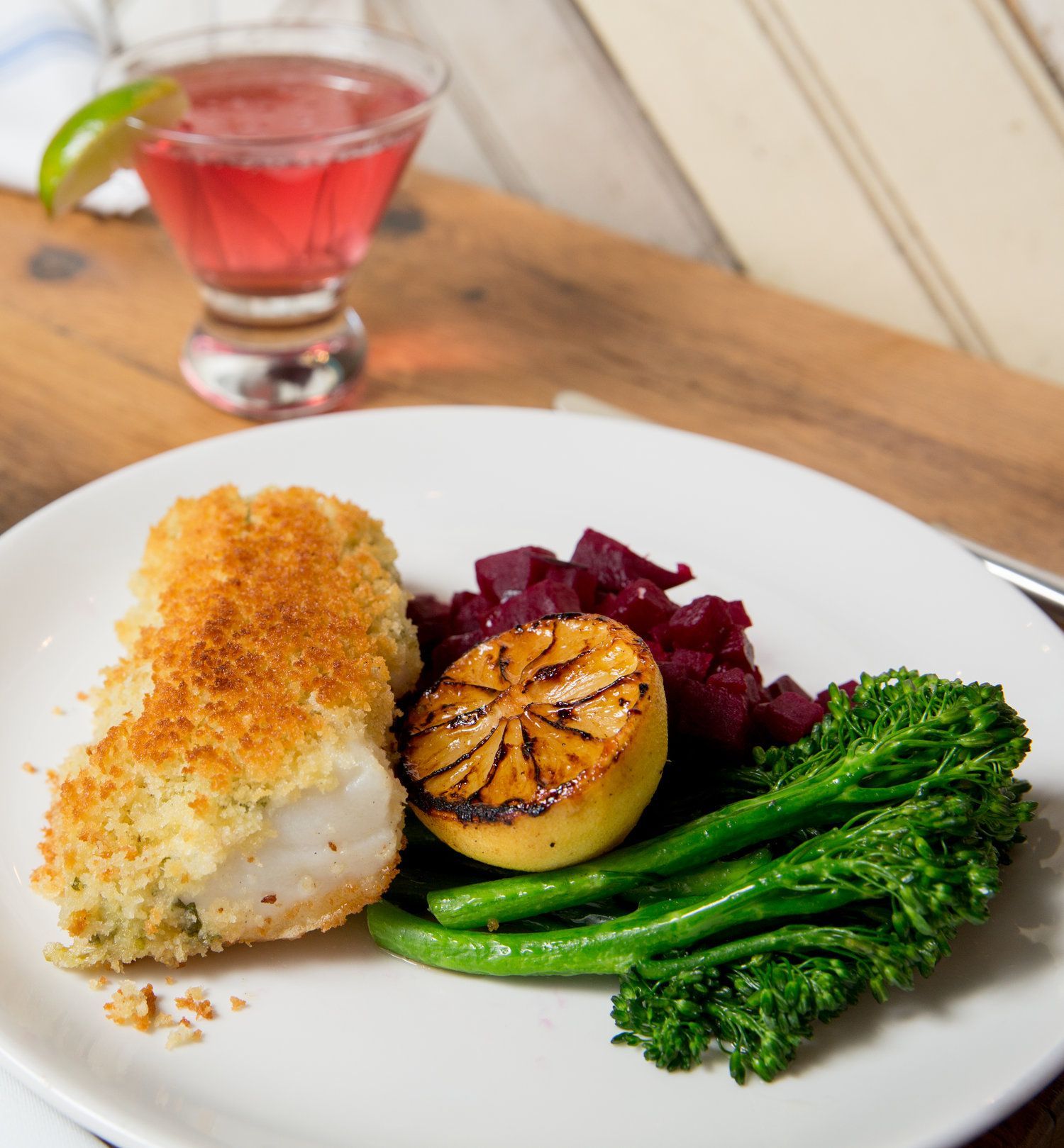 Dinner plate of fish, beets and broccoli at Treeline Kitchen