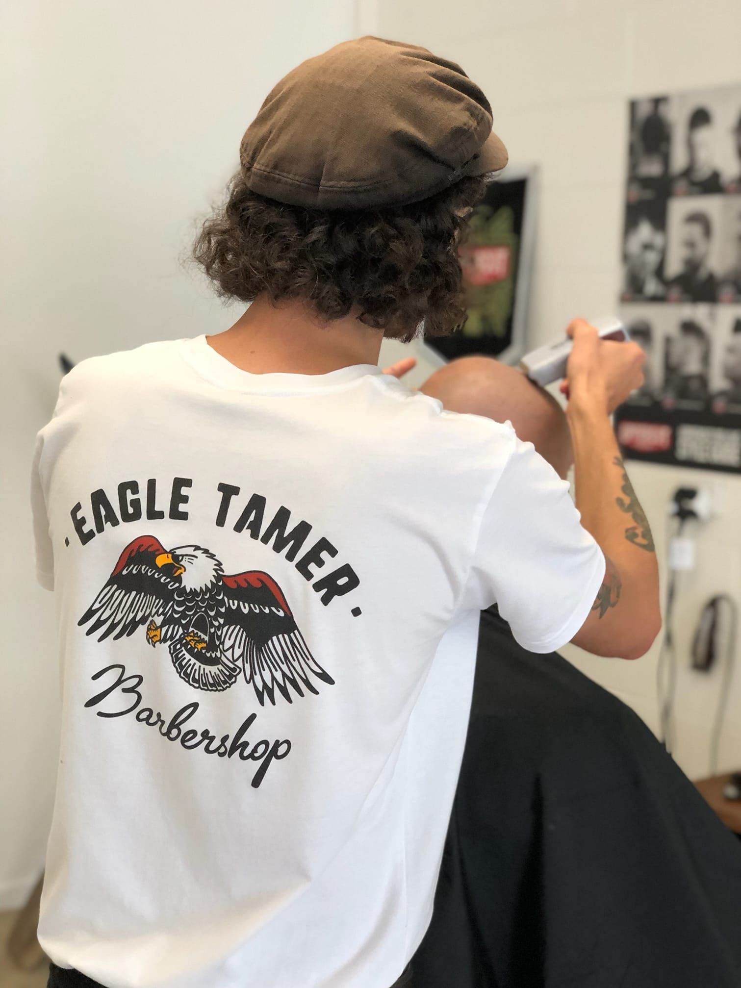 Barber in White T-shirt, Eagle Tamer Barbershop, Cutting Hair — Eagle Tamer Barbershop in Stratford, QLD