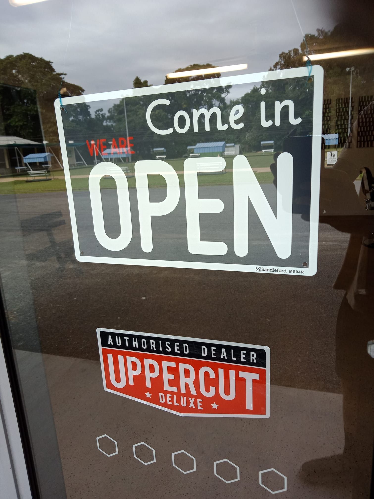 A Man With a Beard Gets a Haircut at a Salon — Eagle Tamer Barbershop in Stratford, QLD