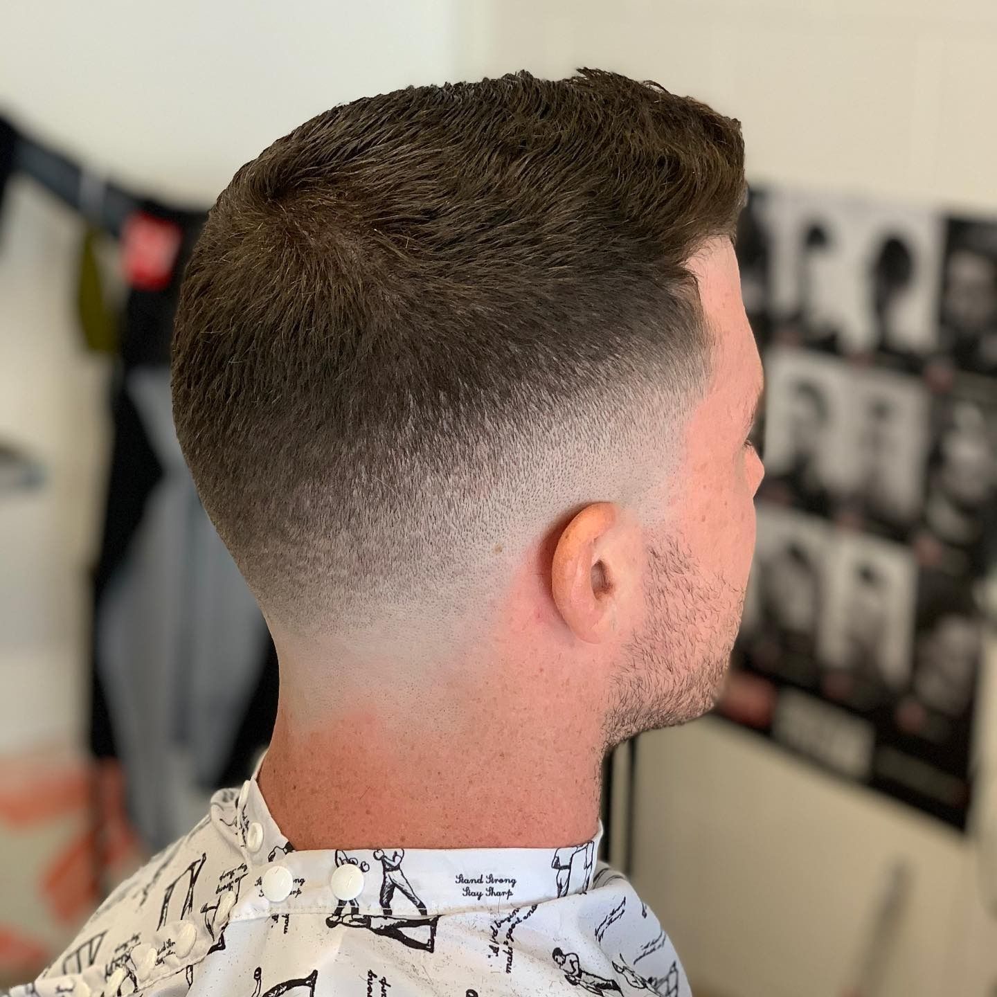 Barber Trimming Hair With Clippers — Eagle Tamer Barbershop in Stratford, QLD