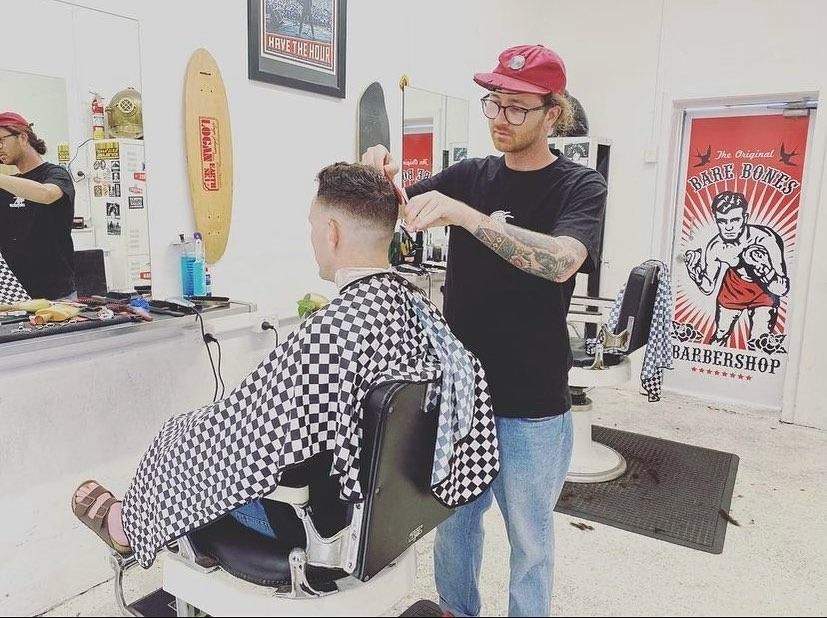 Barber in White T-shirt, Eagle Tamer Barbershop, Cutting Hair — Eagle Tamer Barbershop in Stratford, QLD