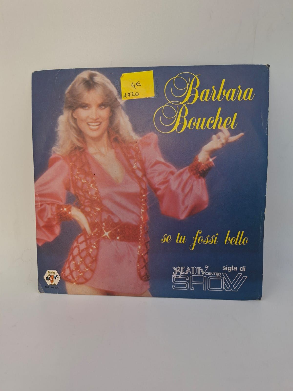 Copertina di un disco in vinile di Barbara Bouchet che la ritrae in un abito rosa su sfondo blu con la scritta 