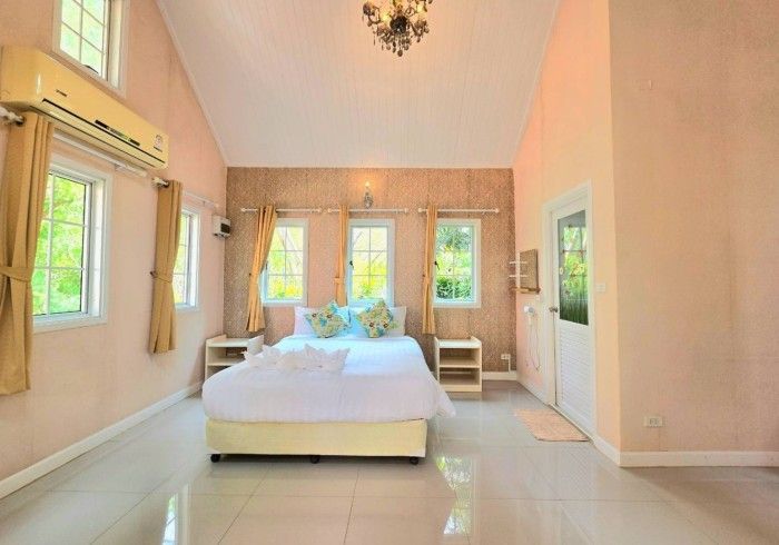 There is a large bed in the middle of the room.