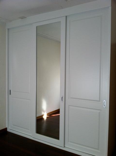 white three door vinyl wrap sliding wardrobe with centre mirror