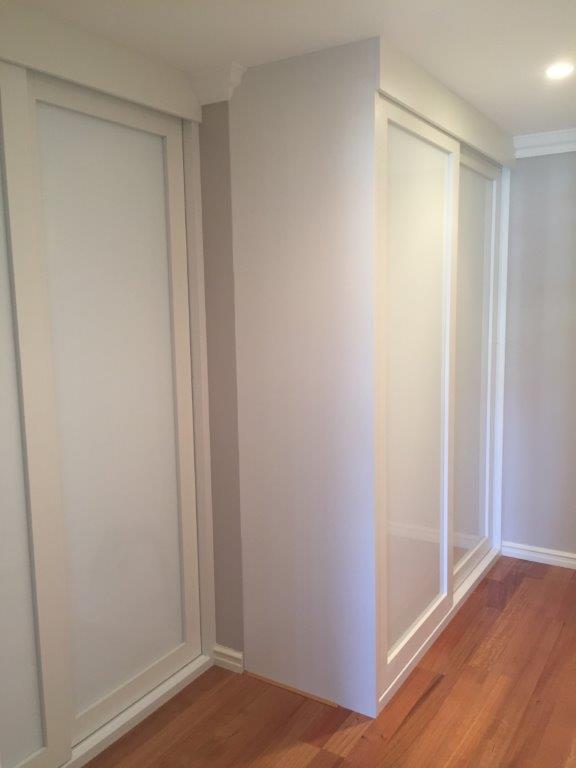 white sliding wardrobe