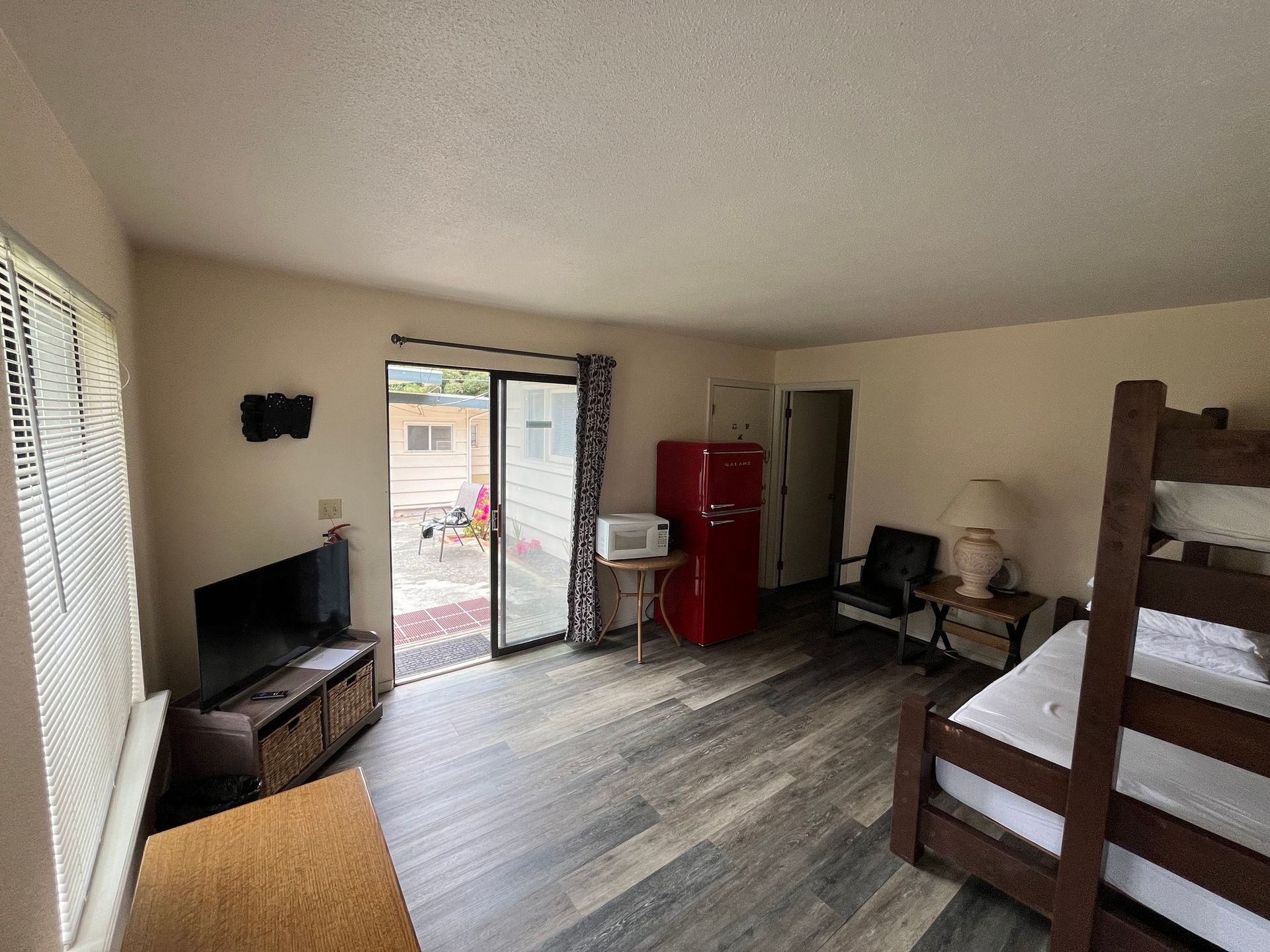 There is a bunk bed in the middle of the room.