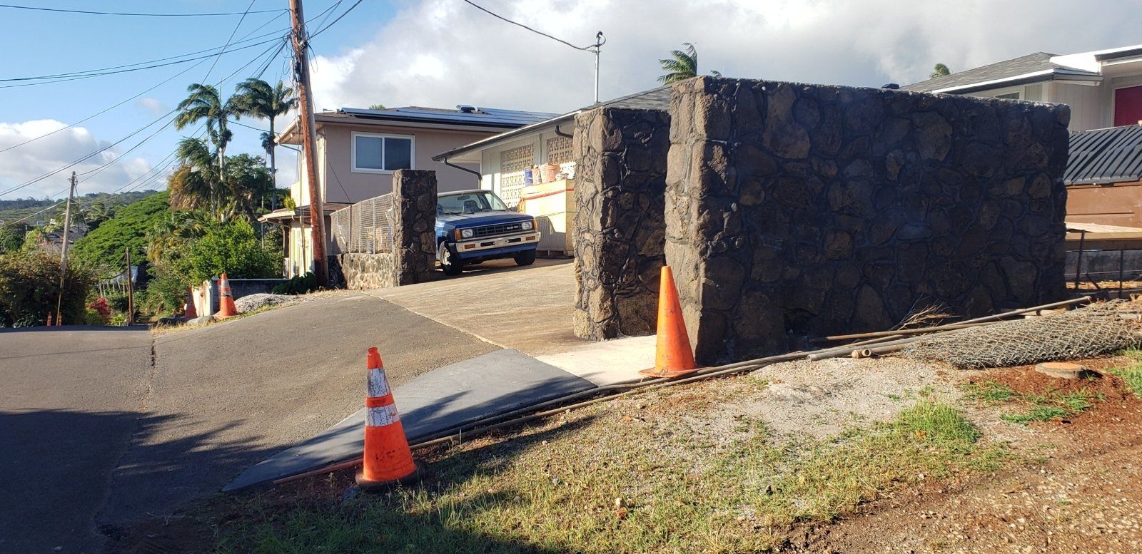 A new lava rock wall Hawaii fence built in Honolulu