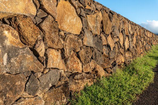 lava rock wall by the beach side