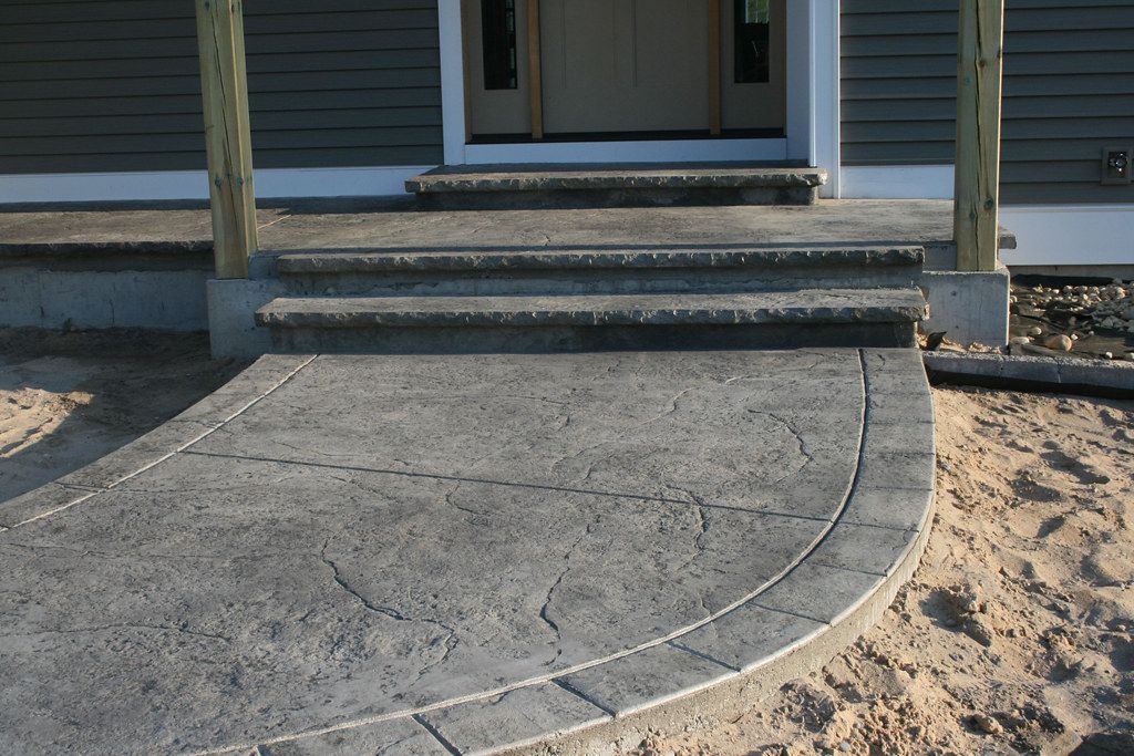 stamped concrete walkway to front door