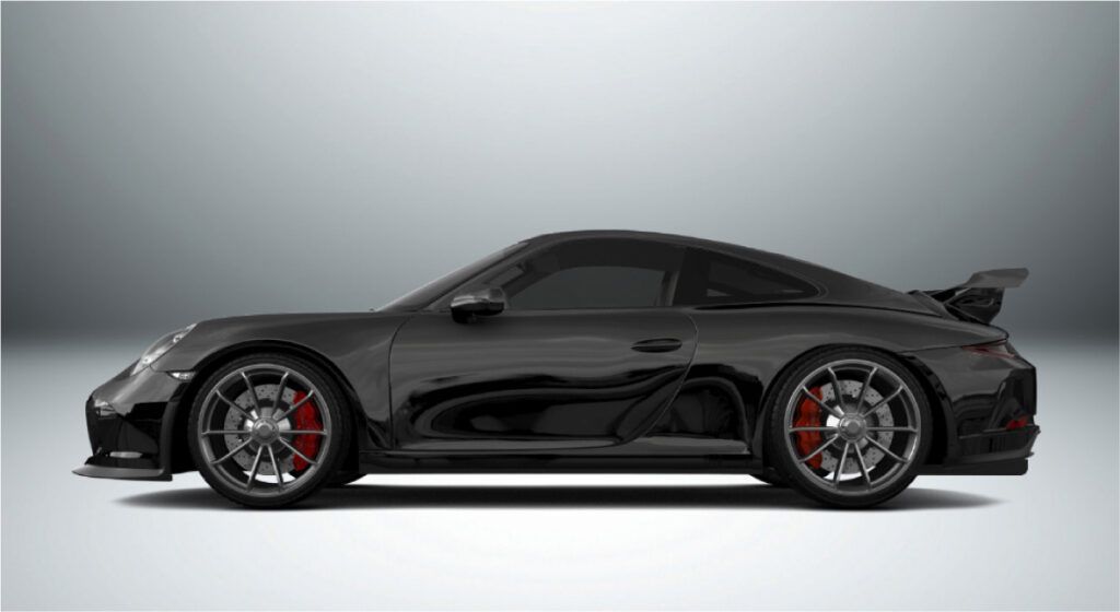 Um porsche 911 gt3 rs preto é mostrado de lado em um fundo branco.