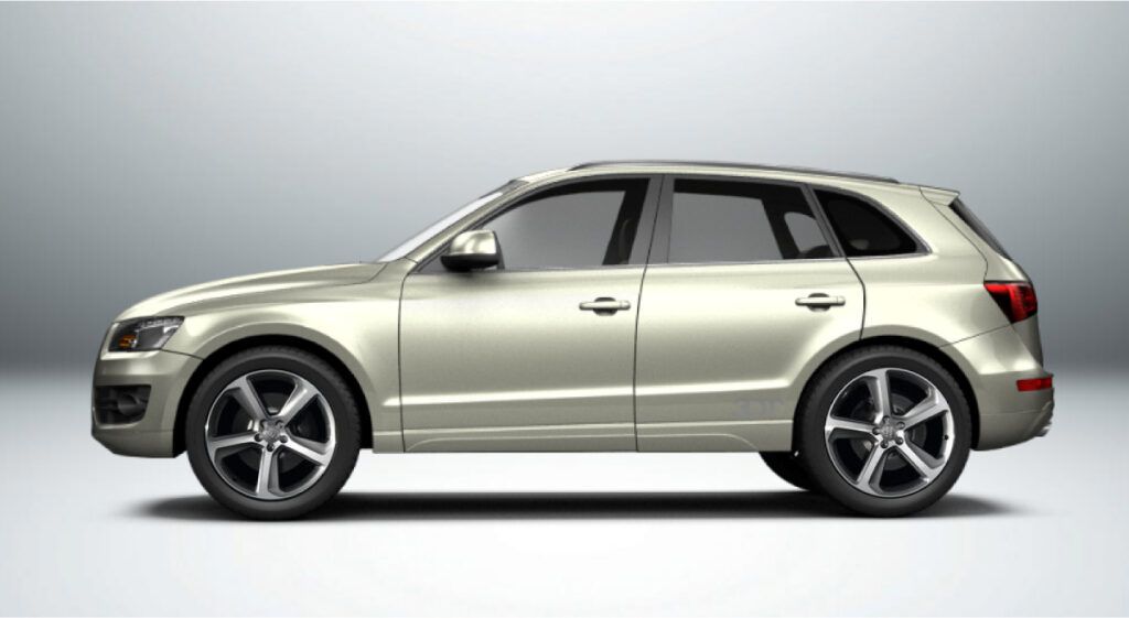 Um audi q5 prateado é mostrado de lado em um fundo branco