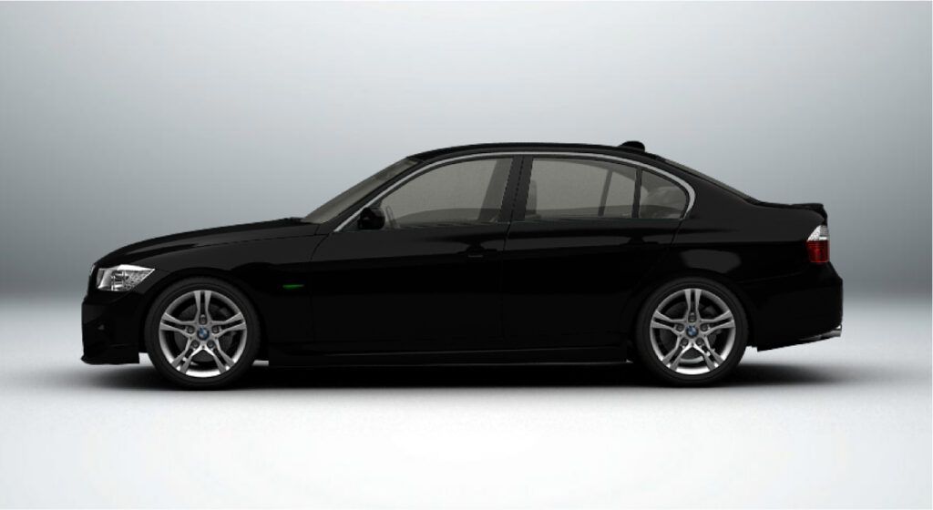 Um carro preto está parado em uma superfície branca