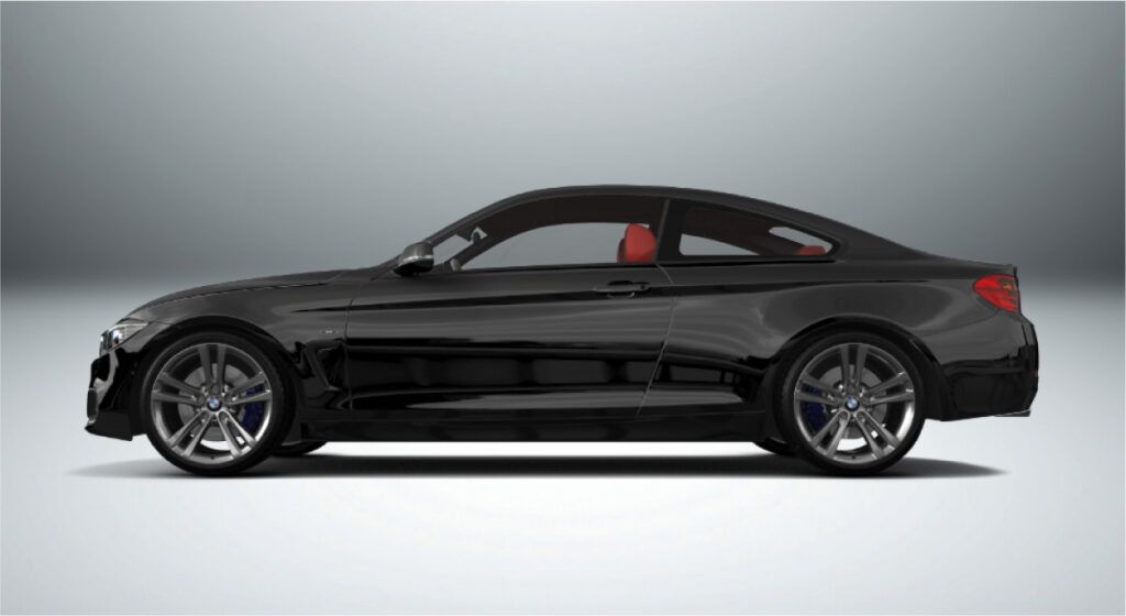 Um carro esportivo preto com assento vermelho sobre fundo branco.