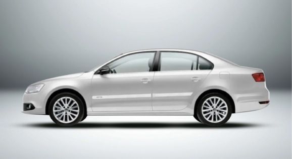 Um carro branco está parado em uma superfície branca.