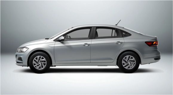 Um carro prateado está parado em uma superfície branca.