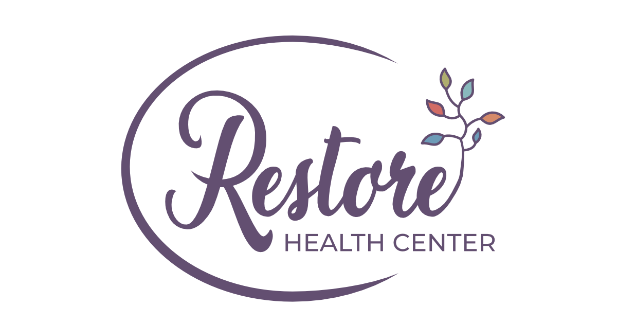 Clean, professional medical spa treatment room with neutral tones at Restore Health Center in Indianapolis