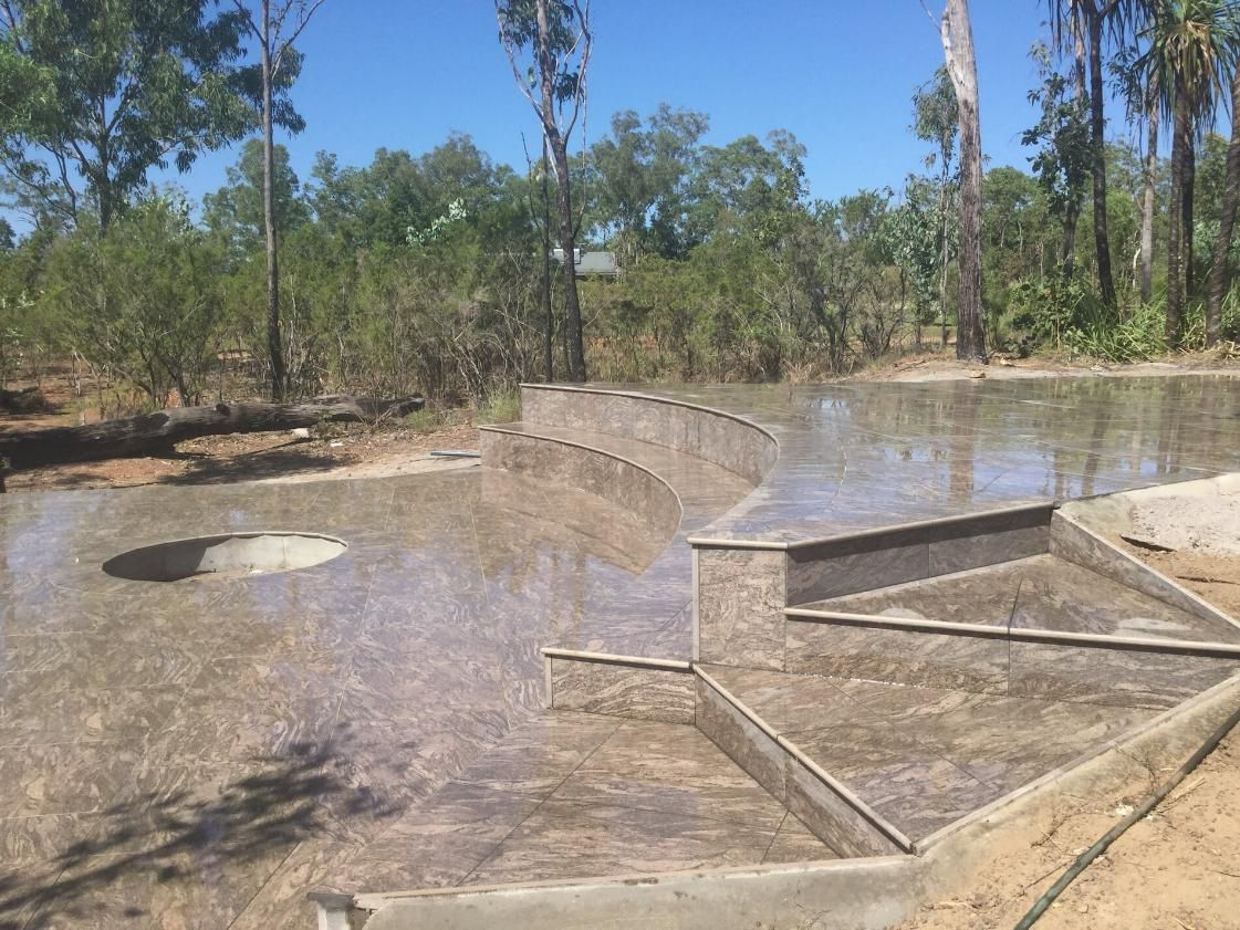 Concrete Tiles Stairs with a Big Hole in the Middle — Paving in Darwin River, NT