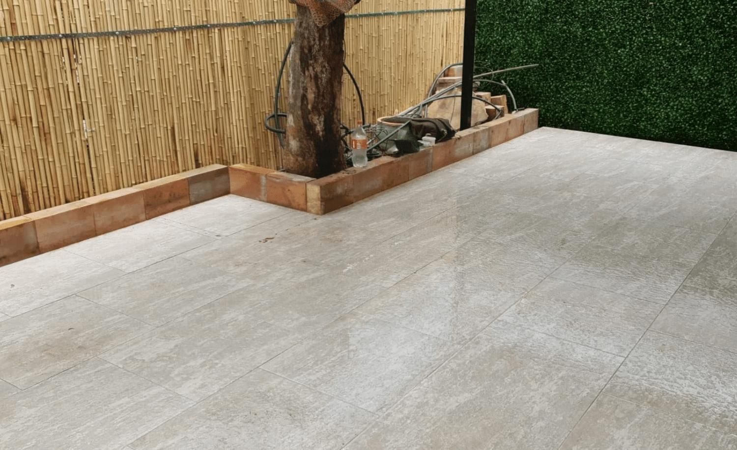 A Patio With A Tree and Beige Coloured Tiles — Paving in Darwin River, NT