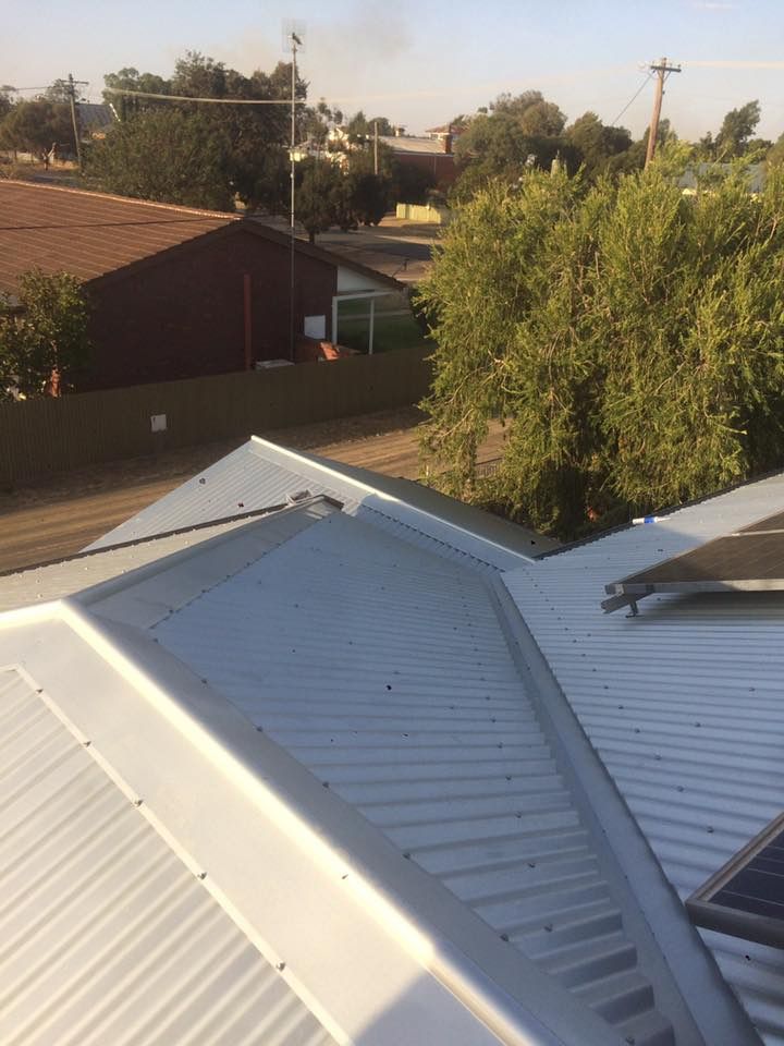 A White Roof With A Solar Panel On It — Matt Walsh Plumbing in Albury, NSW