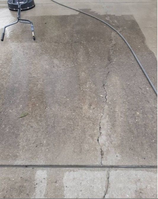 Road is washed by pressure washing