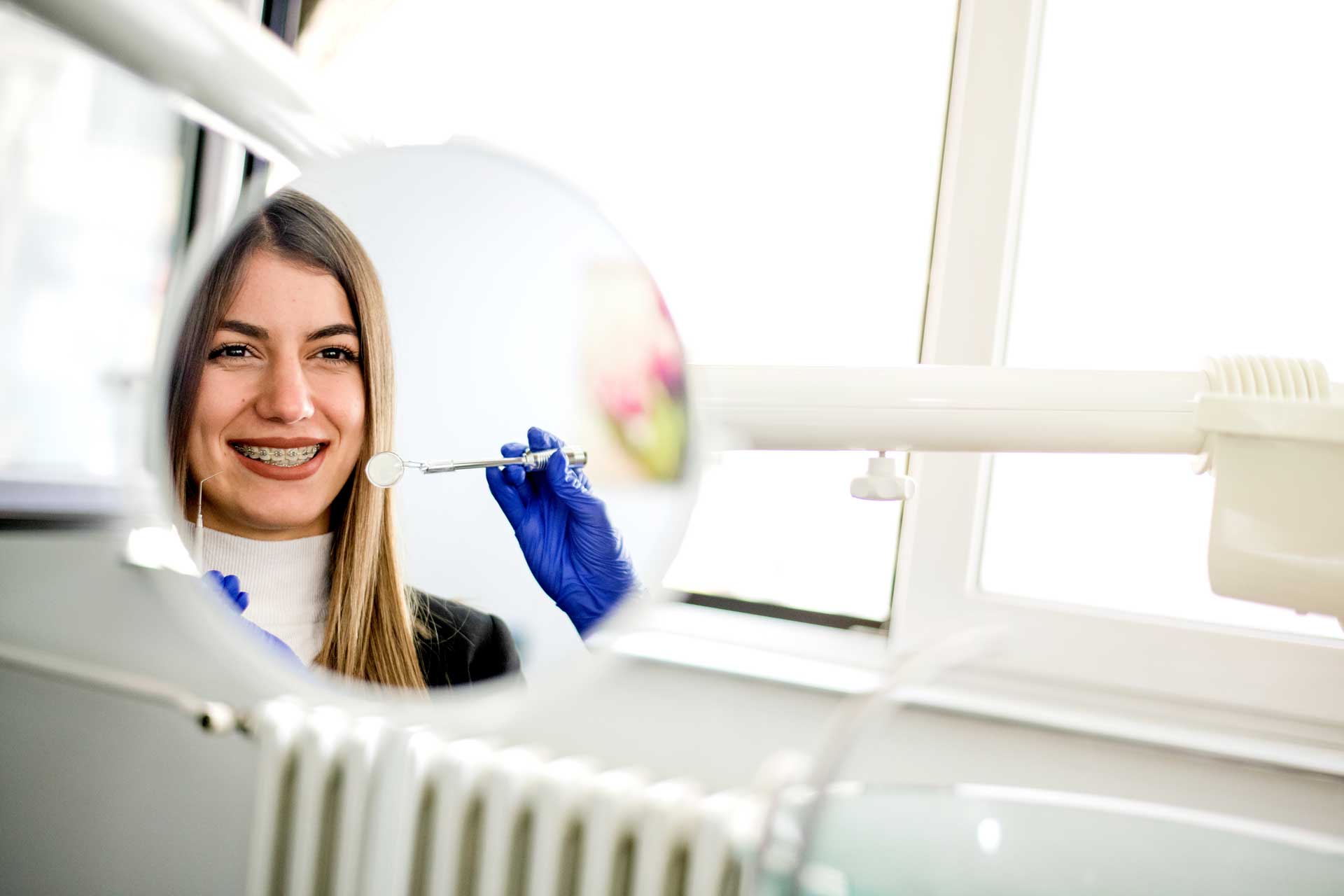 Woman with Braces — Lapeer, MI — Lapeer Family Dental