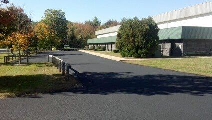 After sealcoating business drive - Seal Coating and Asphalt Patching Specialists - Armor-Guard Sealcoating - Portsmouth, New Hampshire