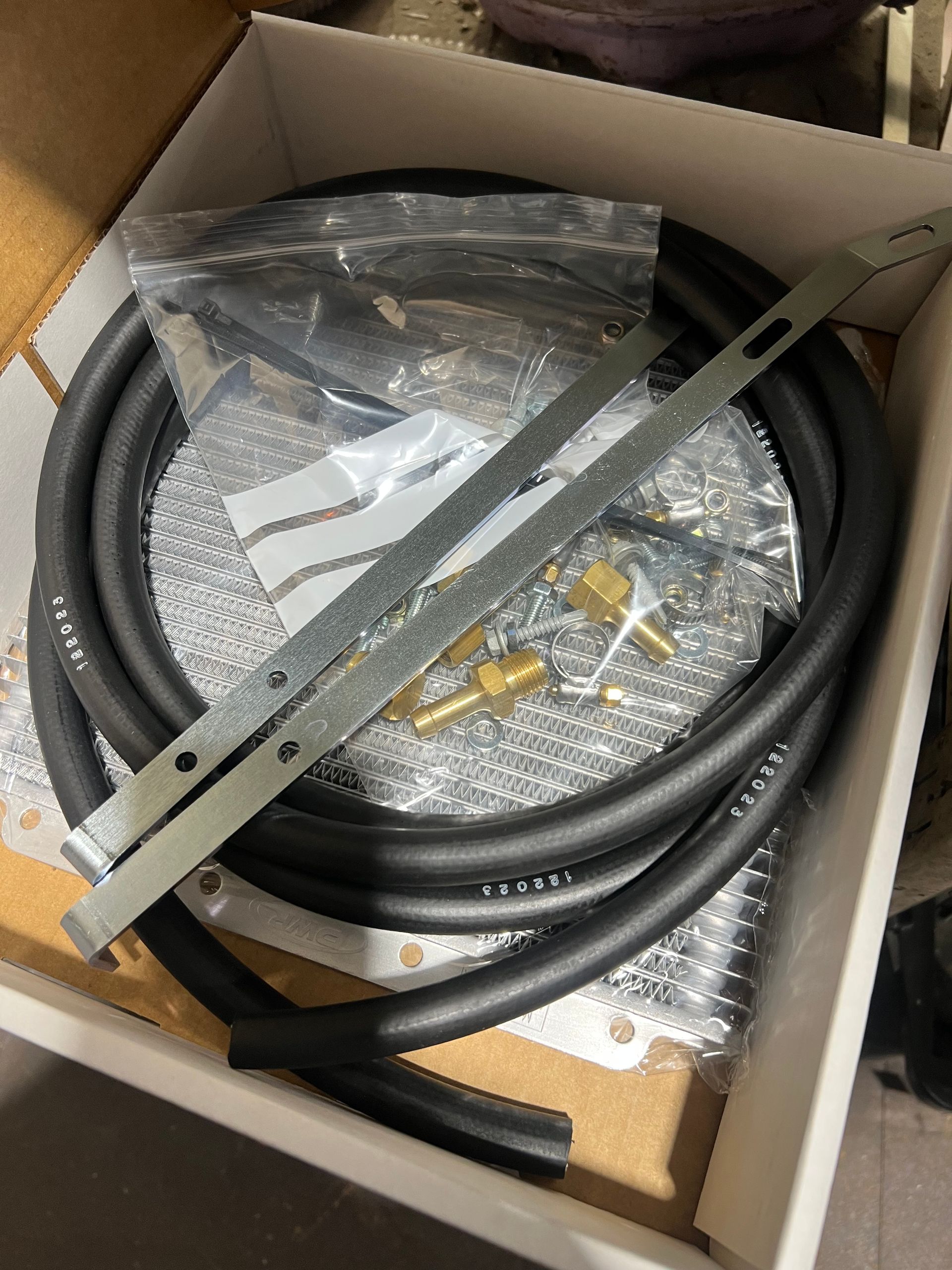 A close up of a radiator on the side of a car