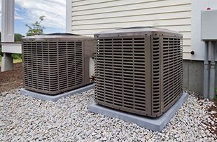 Heating and air conditioning unit — HVAC contractor services in Warrensburg, MO
