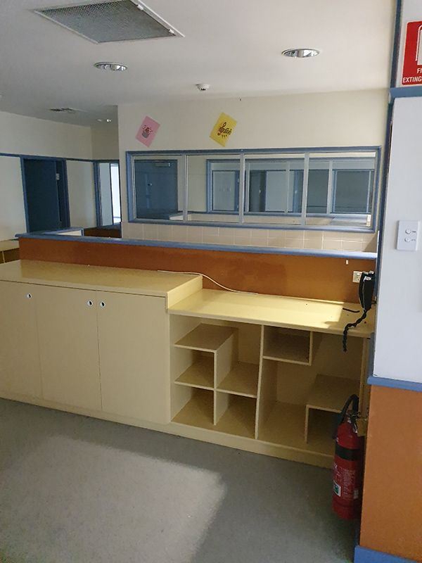 New Spacious Room With Desk And Cabinets — Entire Trades in Port Stephens, NSW