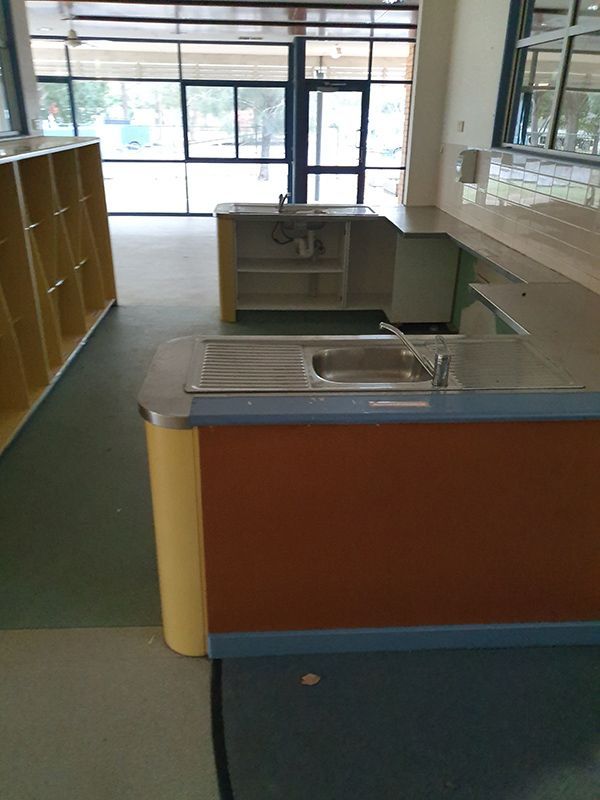 Before the Renovation of the Kitchen With Sink And Counter Top — Entire Trades in Port Stephens, NSW