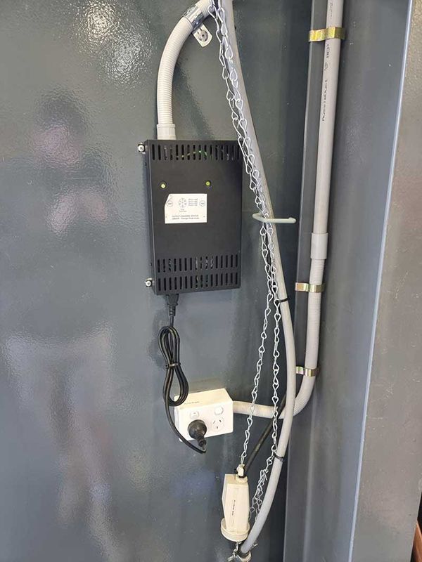 A Power Supply Is Attached To A Wall With Chains — Entire Trades in Cessnock, NSW