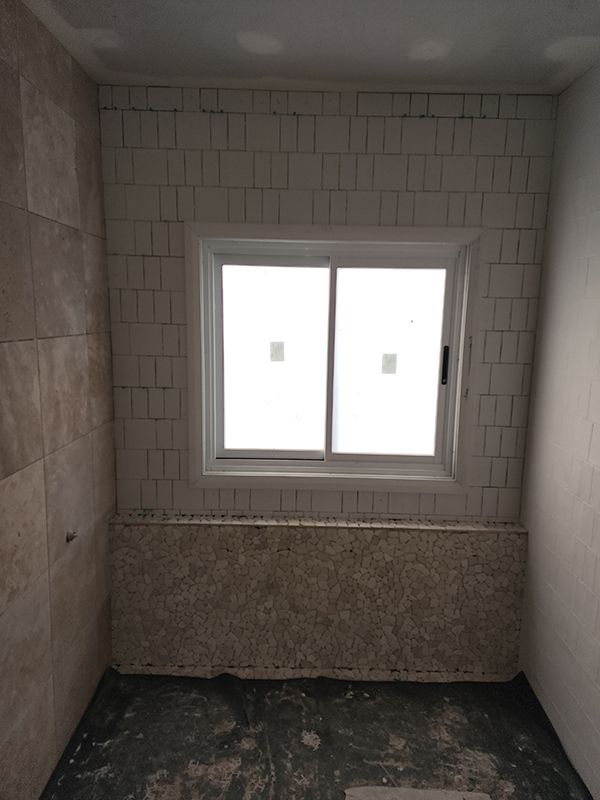 Bathroom Under Construction With Window — Entire Trades in Singleton, NSW