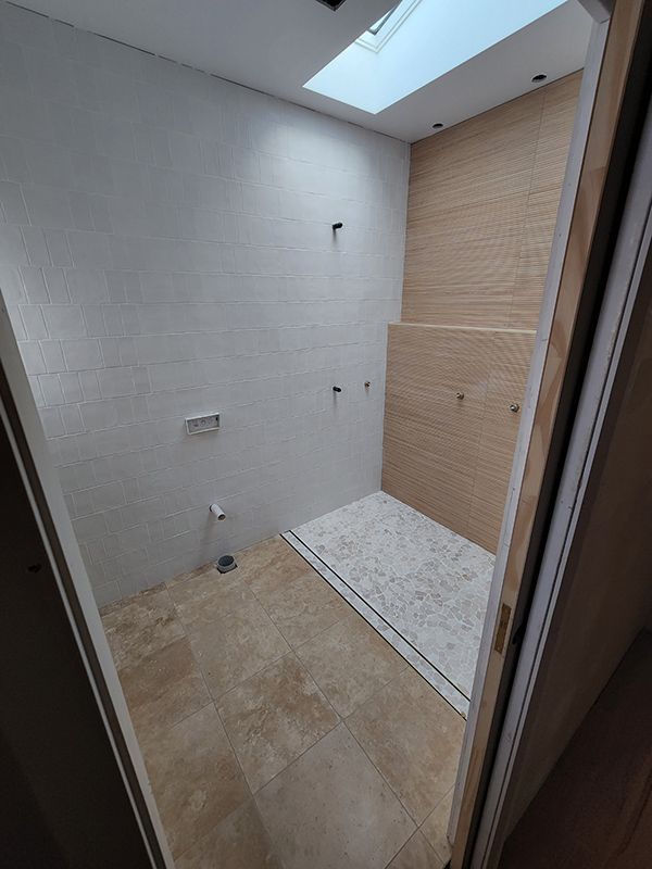 Bathroom With Skylight Under Construction — Entire Trades in Singleton, NSW