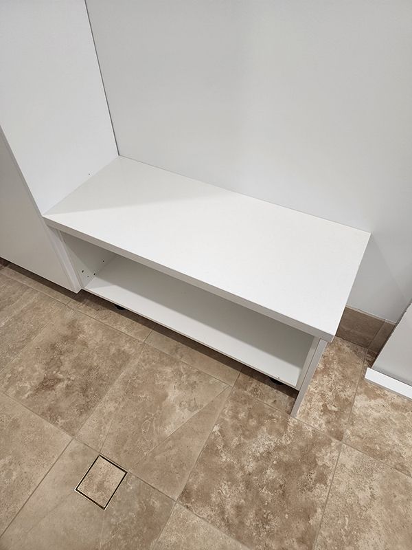 A White Shelf And Sink In A Bathroom — Entire Trades in Singleton, NSW