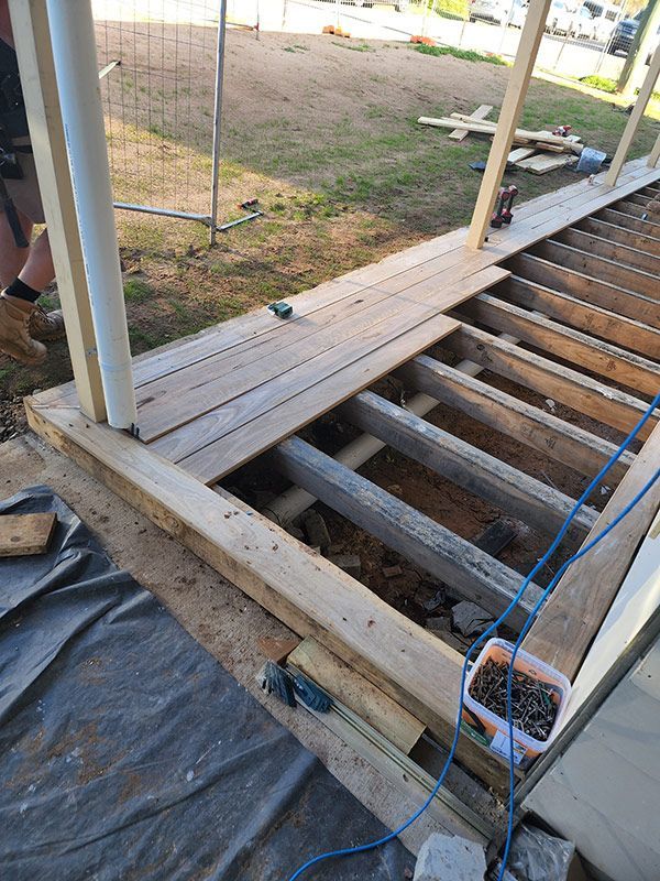 Skilled Workers Building Wooden Deck — Entire Trades in Port Stephens, NSW