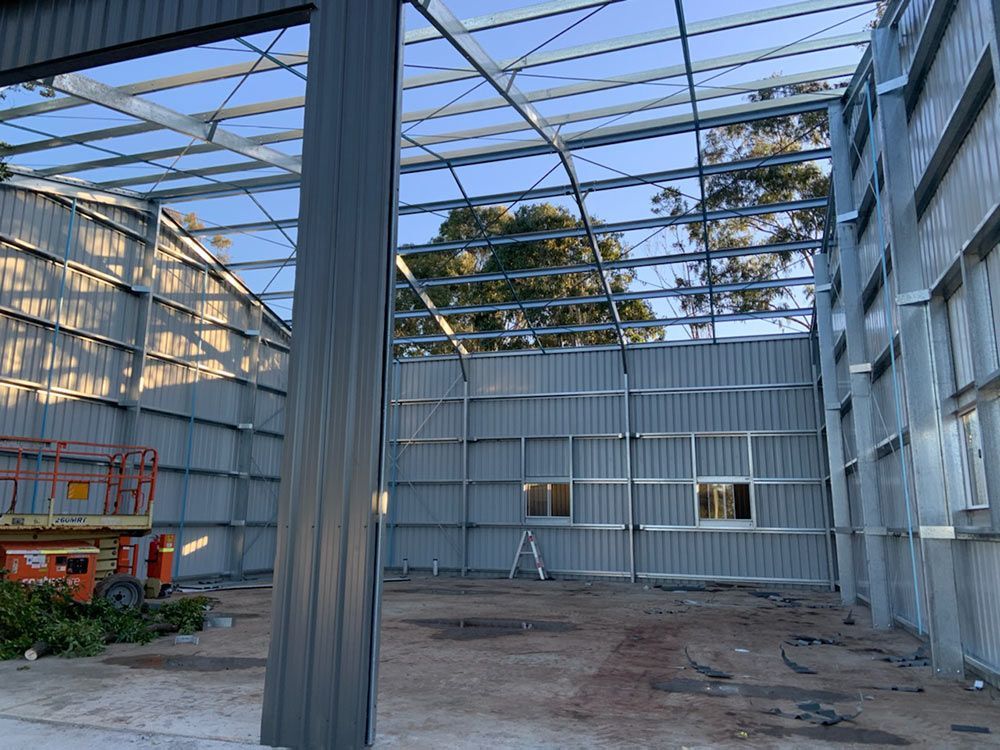 Warehouse Metal Roof Under Construction — Entire Trades in Central Coast, NSW