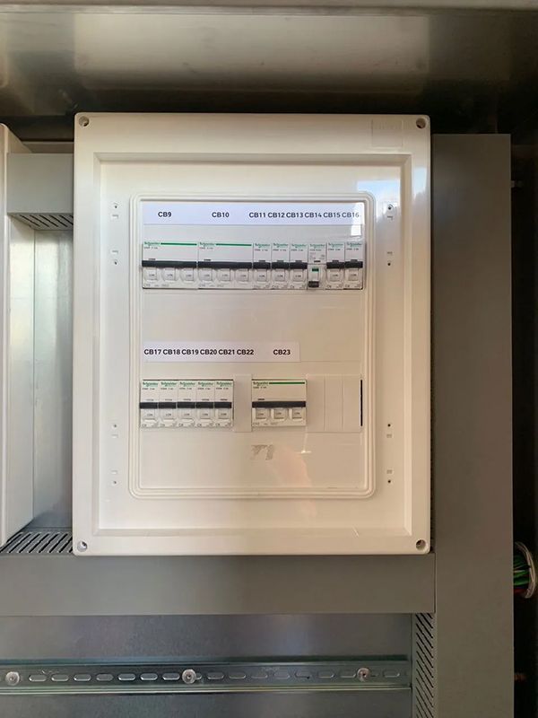 Electrical Switchboard With Lots of Electric Switches — Entire Trades in Cessnock, NSW