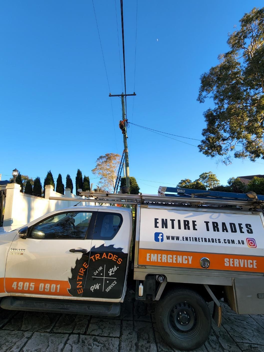 An Entire Trades Truck Is Parked on The Side of The Road — Entire Trades in Maitland, NSW