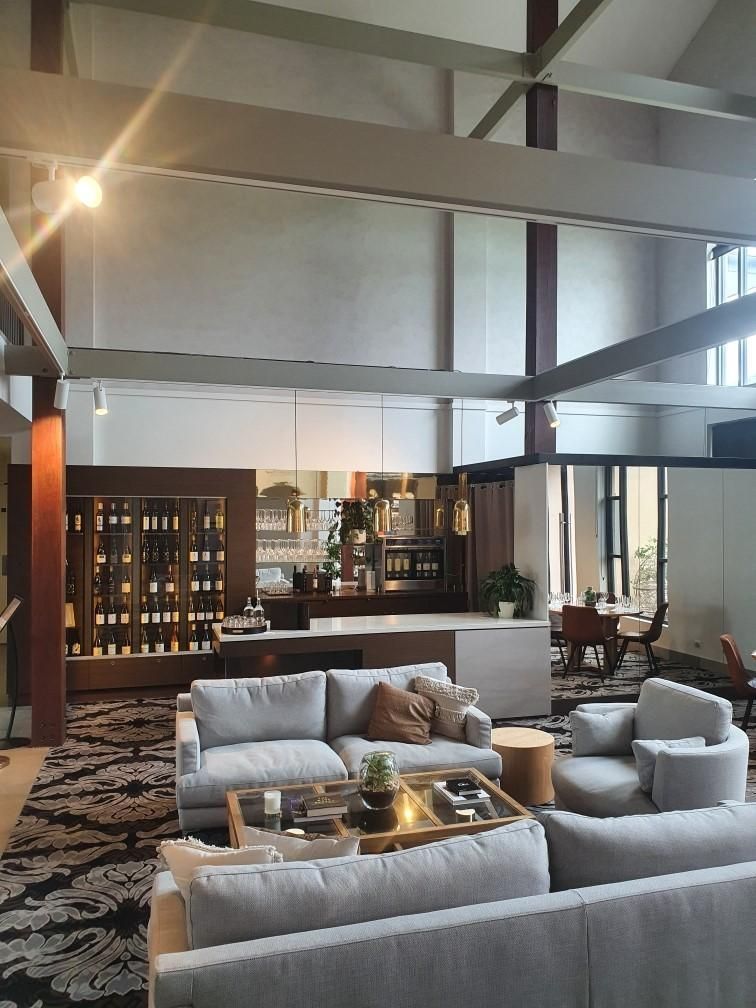 A Living Room with A Lot of Furniture and A Table — Entire Trades in Maitland, NSW