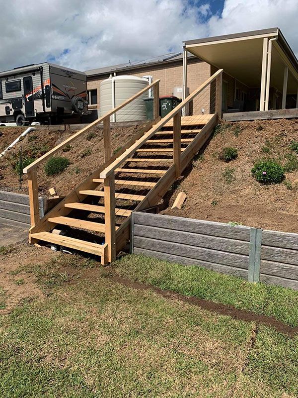Side View Of The Wooden Stairs Of The House — Entire Trades in Central Coast, NSW