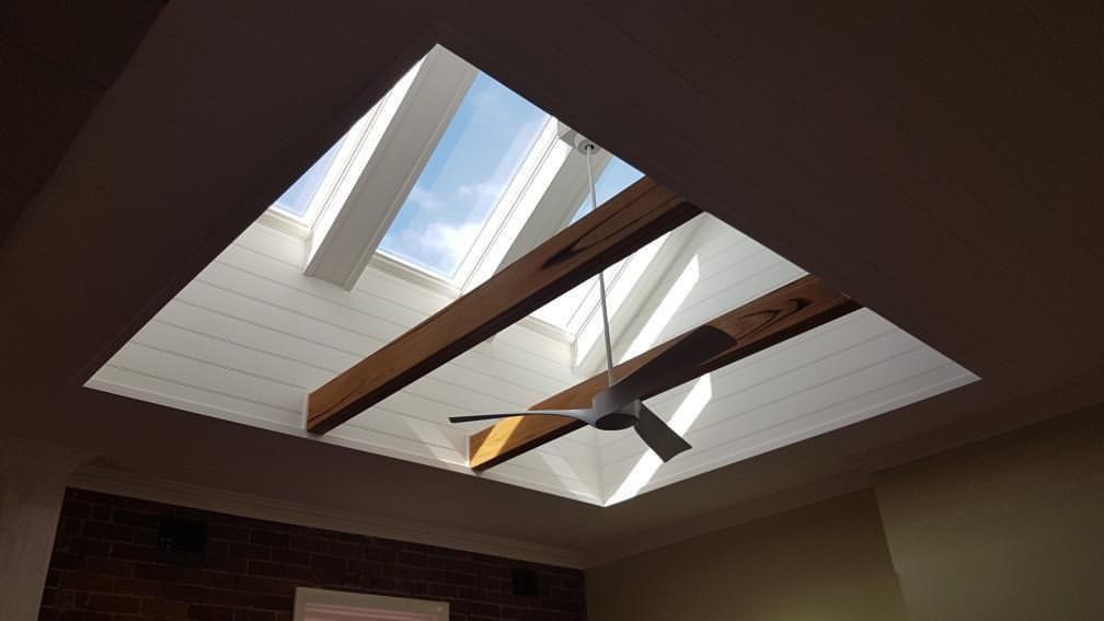 A Room with A Skylight and A Ceiling Fan — Entire Trades in Maitland, NSW